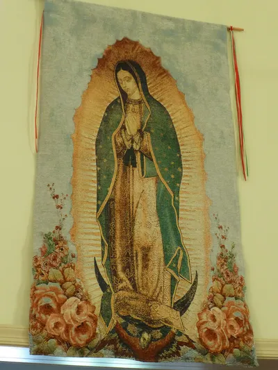 Our Lady of Guadelupe banner.