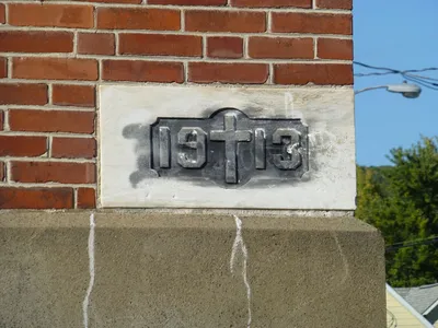 Cornerstone on former church/school.