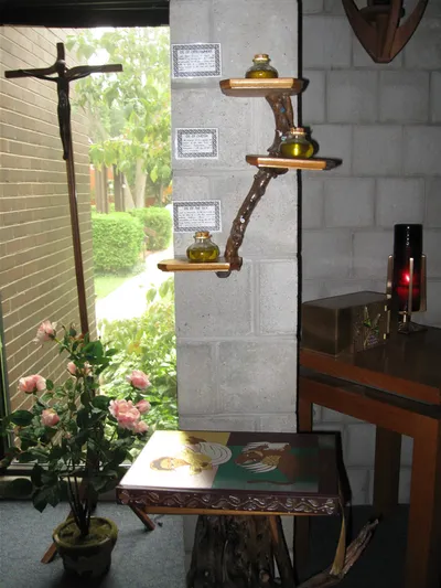 Chrisms, processional crucifix, book of Gospels.