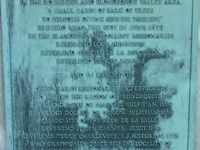 Plaque on the cross.