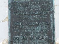 Plaque on the cross.