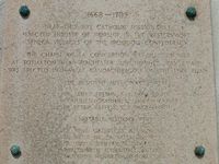 Close-up of plaque, upper part.